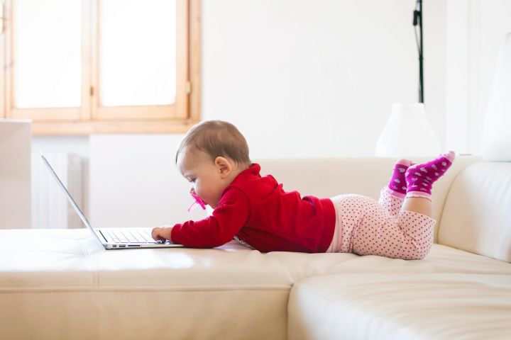 baby-girl-using-a-laptop-2021-08-29-12-15-00-utc-scaled.jpg