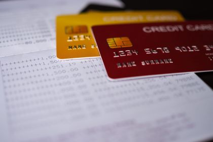 credit-card-on-book-bank-2022-11-09-04-13-15-utc-scaled.jpg