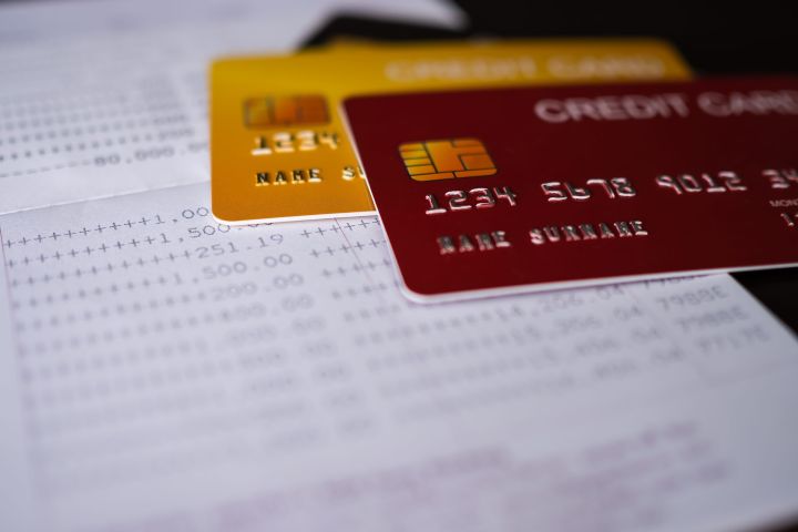 credit-card-on-book-bank-2022-11-09-04-13-15-utc-scaled.jpg