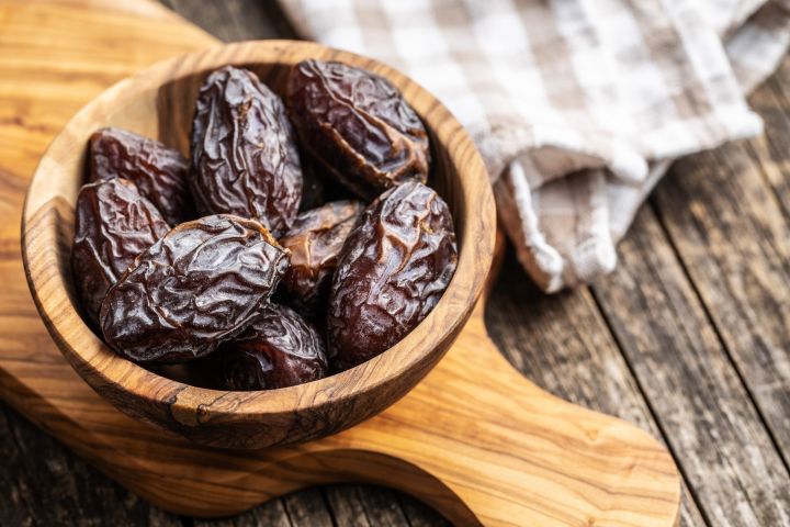 dried-dates-fruit-in-wooden-bowl-2021-08-29-12-14-53-utc-scaled.jpg