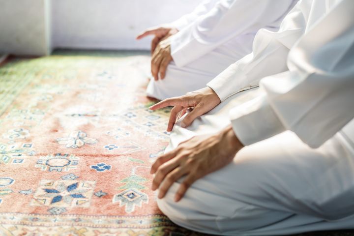muslim-men-praying-in-tashahhud-posture-2021-08-27-00-05-43-utc-scaled.jpg