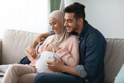 pregnancy-music-happy-pregnant-muslim-couple-plac-2021-09-02-05-08-43-utc-scaled.jpg