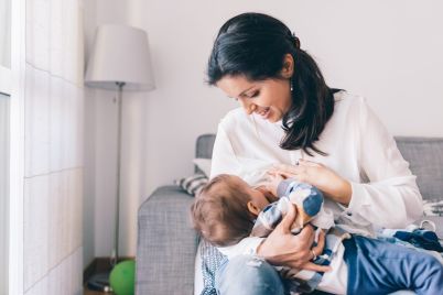 woman-breastfeeding-little-boy-newborn-2022-01-21-23-15-34-utc-scaled.jpg